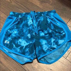 blue athletic shorts with pockets